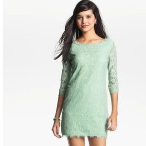Mint colored lace shift dress.
